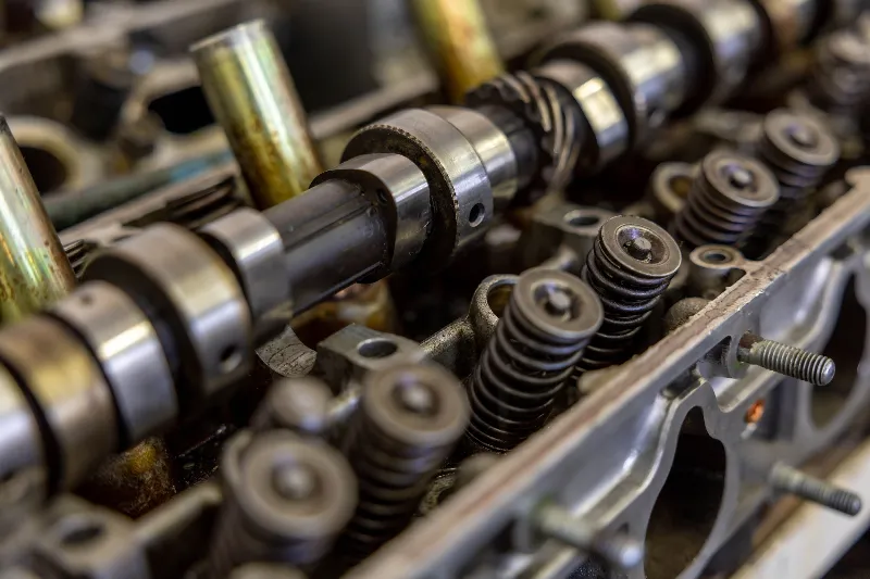 Close-up of an engine camshaft and valve springs